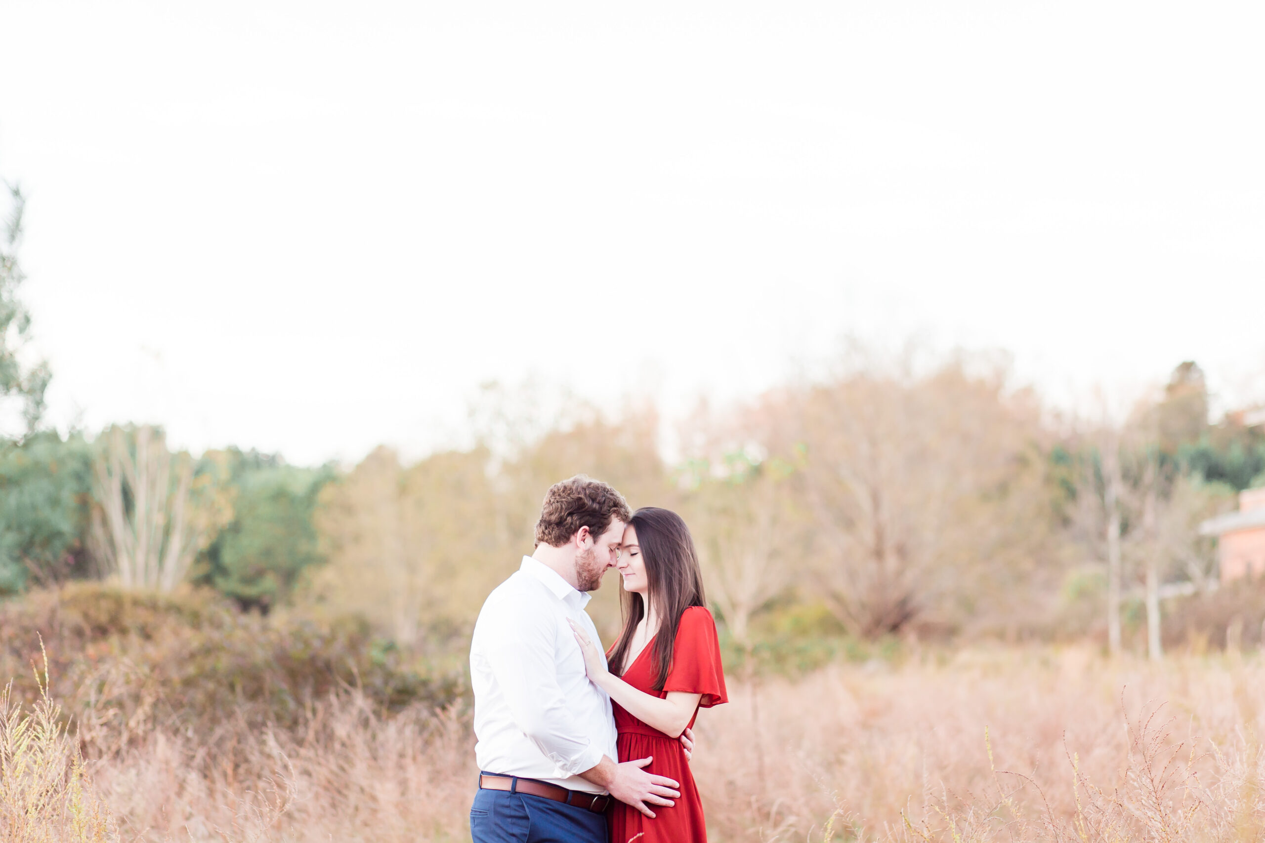 Couple doing forehead to forehead at an engagement session photoshoot